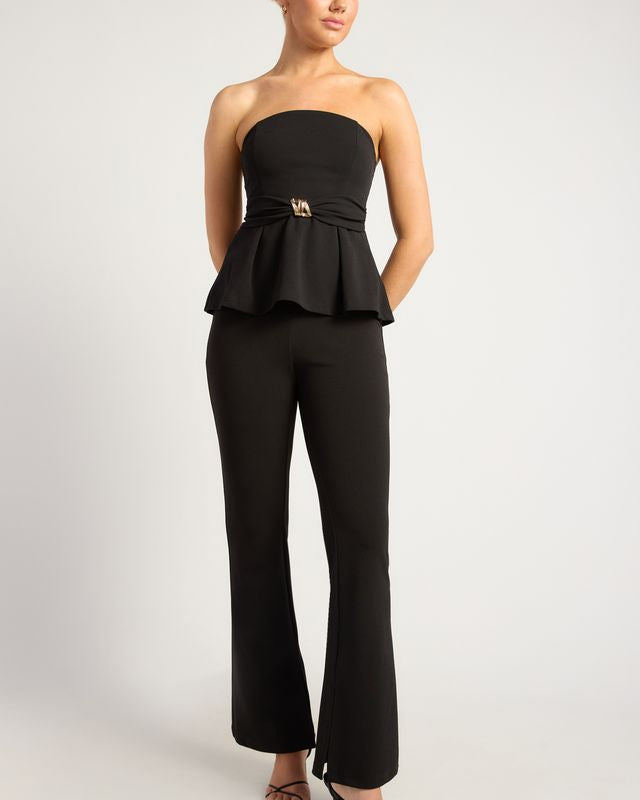 Women's black strapless peplum tube top with gold waist accent, the Ellisia Top in Black by Esther & Co