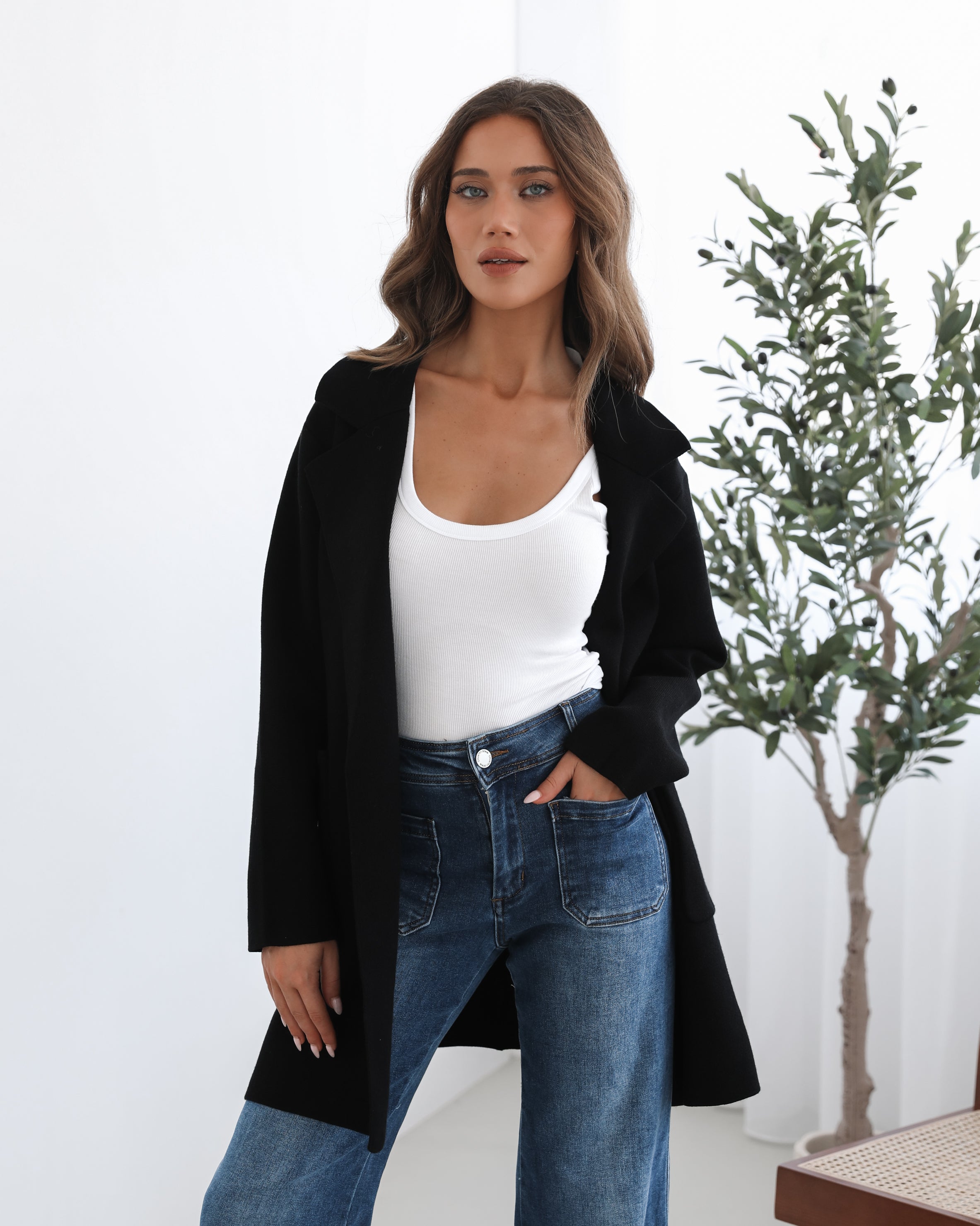 cream print blazer on a knit top