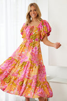 Axelle Dress in Sunset Print sunset print square neckline dress back view