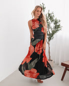 Women's black maxi dress with bold red floral print, the Balayage Dress in Black Floral by Esther & Co