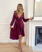 Model wearing the Bryleigh Bordeaux Dress styled with strappy heeled sandals for a wedding or races look