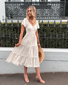 Celie Dress in Beige beige linen midi dress side view