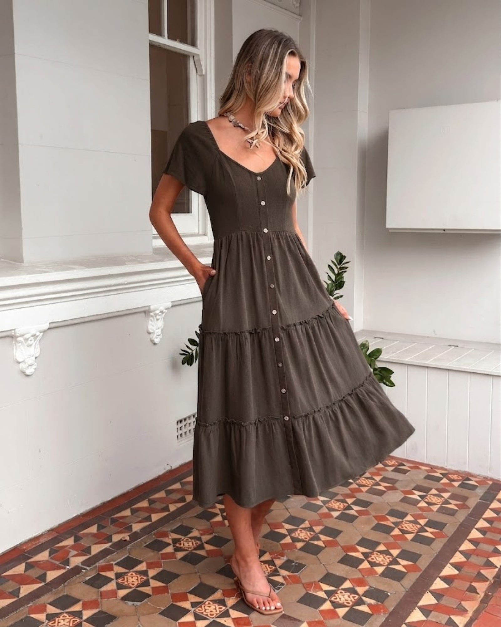 Celie cocoa linen midi dress with V neckline and button front, side view