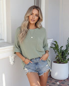Evandra sage knit top, front view