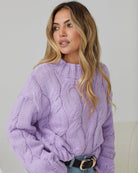 Women wearing the Hadi Knit in Lilac, a soft acrylic blend relaxed fit knit jumper in a beautiful cool-toned lilac