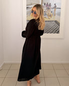 Iolana black long sleeve midi dress, side view