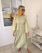 Iolana Dress in Soft Khaki Long Sleeve womens long sleeve khaki midi close up detail