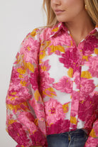 Janette Shirt in Pink Floral pink floral embossed blouse full length view