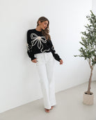 Junaelle Knit in Black Multi black multi knit with bow detail full length view
