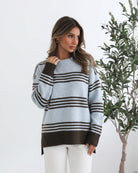 Kessie Knit in Blue Stripe blue and chocolate stripe knit with ribbed cuffs side view