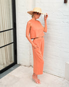 Lighthouse rust linen pants, styled view