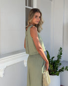 Lizzo Top in Sage sage linen crop top with button back detail side view