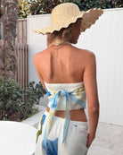 Women's blue floral strapless crop top front view by Esther & Co