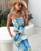Women's blue floral crop top with smocked tie back by Esther & Co