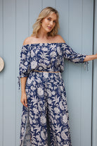 Women's black mono print crop top with off-shoulder neckline by Esther & Co