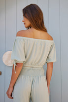 Women's sage off-shoulder crop top rear view by Esther & Co