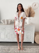 Women's white floral high waisted a-line mini skirt, the Paulette Skirt in White Floral by Esther & Co