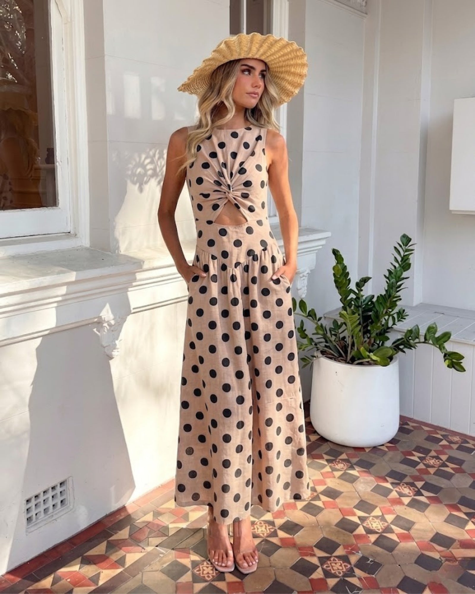 Rafiya beige spot linen midi dress with round neckline and cutout waist, side view