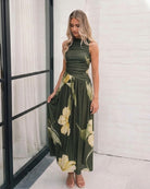 Sandrine Dress in Olive Floral womens floral maxi dress in olive with yellow botanical print front view