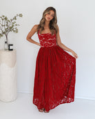 Women's red maxi dress with halter neckline by Esther & Co