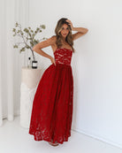 Women's red print halter neck maxi dress with flowy skirt, the Shira Dress in Red Print by Esther & Co