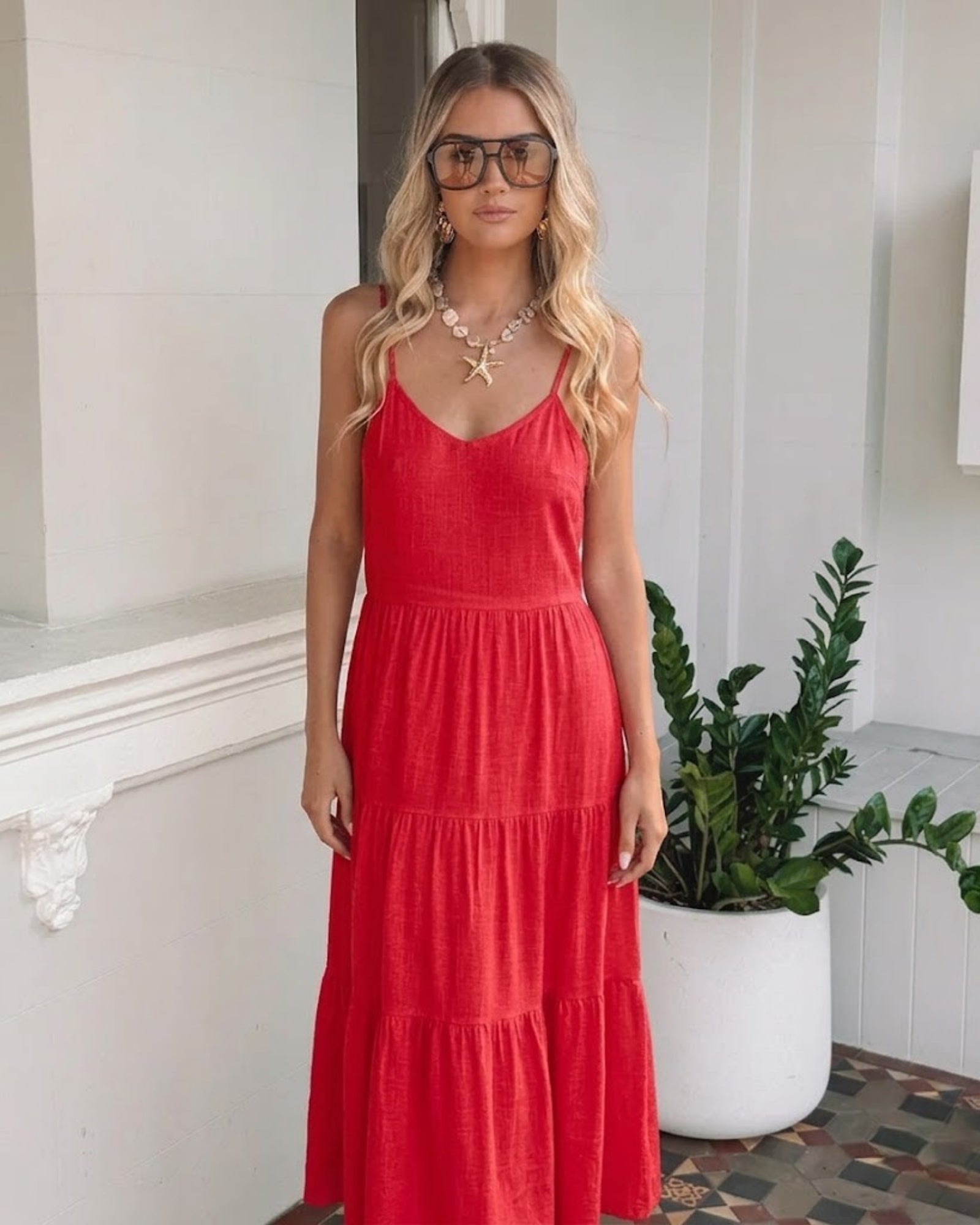 Sonya cherry red tiered linen midi dress with shirred back, full length view