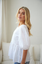Tonya Top in White white cotton linen blouse with frill hem side view