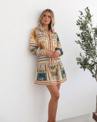 Women's printed mini shirt dress with striped balloon sleeve cuffs by Esther & Co