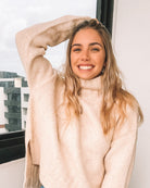 Front view of the Chesterfield Beige Knit Jumper showing the relaxed fit and long sleeves