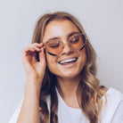 Cadence blush sunglasses, folded view